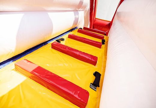 Buy a large circus themed inflatable bouncer with multiple slides and all sorts of fun obstacles with themed prints for kids. Order bouncers online at JB Inflatables America