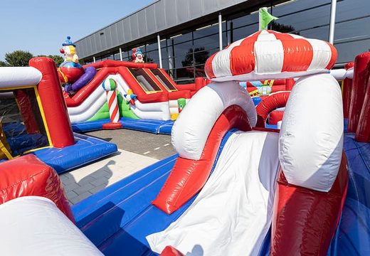 Order an inflatable circus bouncer with slides and fun obstacles with prints for children. Buy bouncers online at JB Inflatables America