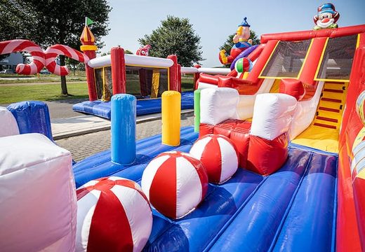 Order a circus themed inflatable bouncer with multiple slides and all kinds of fun obstacles with prints for kids. Buy bouncers online at JB Inflatables America
