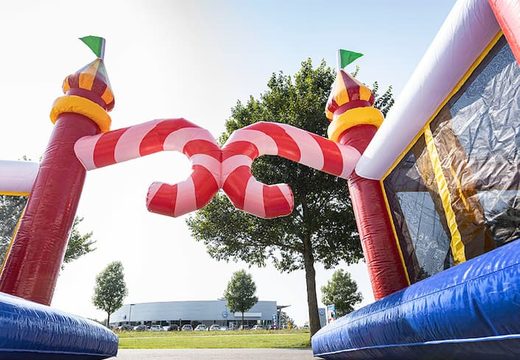 World circus bounce house with multiple slides and all kinds of obstacles with prints that match the theme for children. Buy bounce houses online at JB Inflatables America