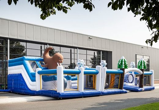 Frozen themed inflatable bounce house with multiple slides and all kinds of fun obstacles with prints that match the theme for kids. Order bounce houses online at JB Inflatables America