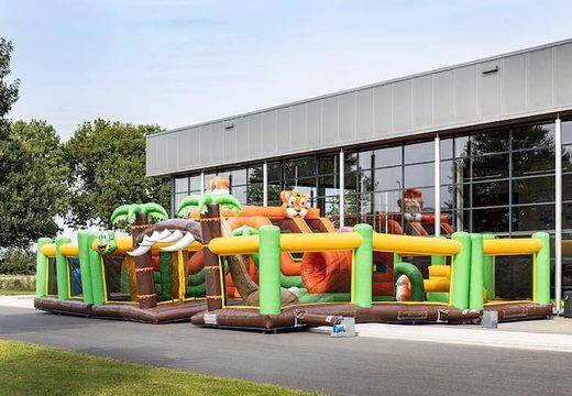 Order colored inflatable park in jungle theme for children. Buy bounce houses online at JB Inflatables America