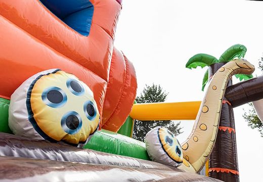 Jungle themed inflatable bounce house with slides and fun obstacles with prints for children. Buy bounce houses online at JB Inflatables America