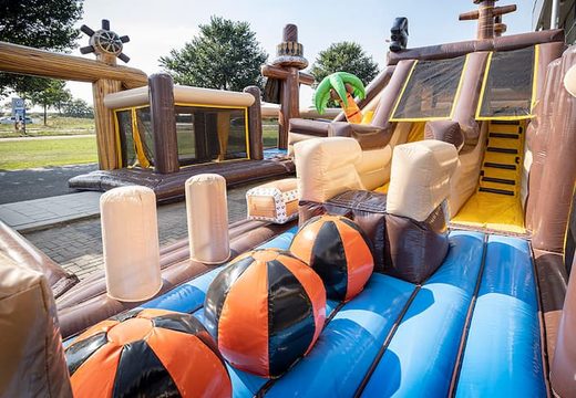 Inflatable pirate bouncer with slides and fun obstacles with prints for children. Buy bouncers online at JB Inflatables America