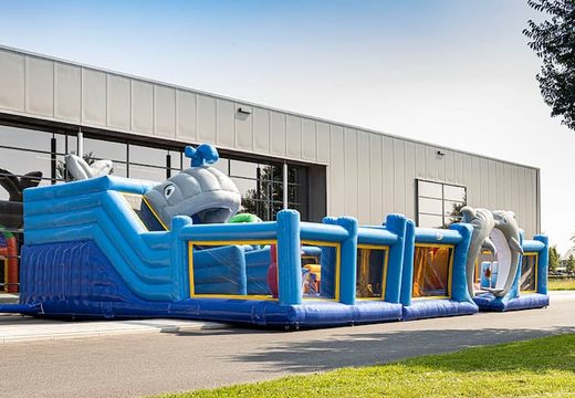 Seaworld themed inflatable bounce house with multiple slides and all sorts of fun obstacles with themed prints for kids. Order bounce houses online at JB Inflatables America