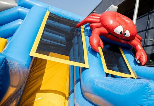 Buy Seaworld bounce house with slides, obstacles and fun seaworld themed prints for kids. Order bounce houses online at JB Inflatables America