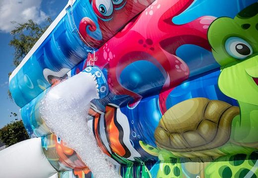 Open Bubble park seaworld with a foam crane to use for kids. Order inflatable bouncers at JB Inflatables America