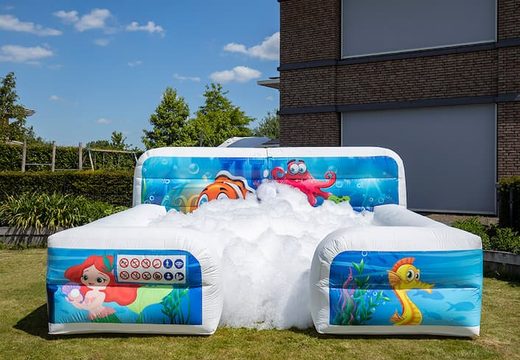 Bubble boarding park bounce house with a foam crane in the Seaworld theme for children. Buy inflatable bounce houses online at JB Inflatables America