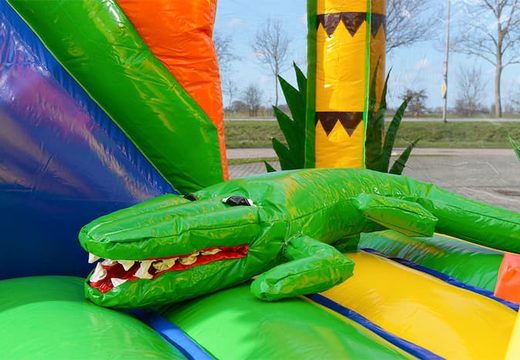 Order a covered multiplay jungle bouncer in a limited height of 2.74 meters and with a slide for both old and young. Buy bouncers online at JB Inflatables America 