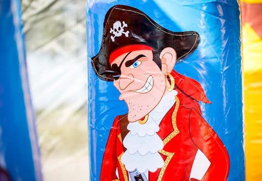 Order a large Indoor pirate bouncer with a slide on the jumping surface, climbing tower and fun obstacles in pirate themed with prints for kids. Buy bouncers online at JB Inflatables America 