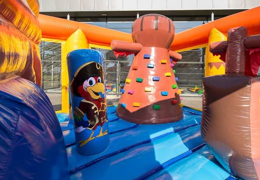 Pirate themed bounce house with a slide for children. Order bounce houses online at JB Inflatables America 