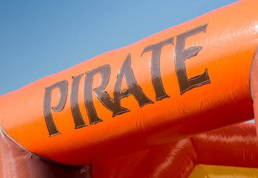 Buy a large Indoor pirate bounce house with a slide on the jumping surface, climbing tower and fun obstacles in pirate themed with prints for kids. Order bounce houses online at JB Inflatables America .