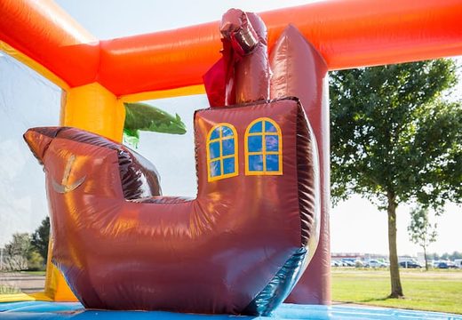 Buy a large Indoor pirate bouncer with a slide and jungle themed prints for kids. Order bouncers online at JB Inflatables America .