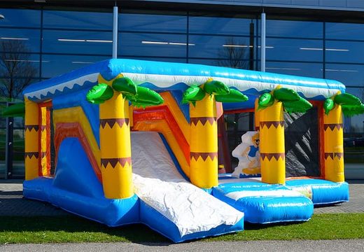 Buy a large Indoor Beach bounce house with a slide on the jumping surface, climbing tower and fun obstacles inbeach themed with prints for kids. Order bounce houses online at JB Inflatables America .