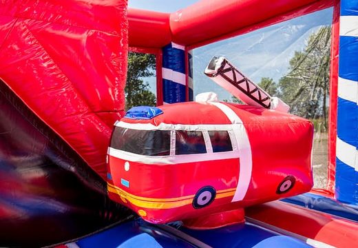 Indoor fire brigade bounce house with a slide for children. Buy bounce houses online at JB Inflatables America 