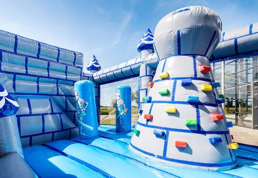 Order a covered multiplay castle bounce house in a limited height of 2.74 meters and with a slide for both old and young. Buy bounce houses online at JB Inflatables America 
