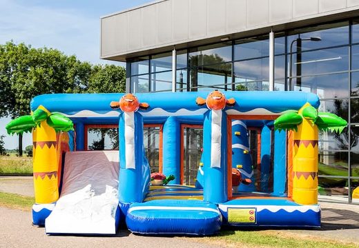 Buy a large Indoor seaworld bounce house with a slide on the jumping surface, climbing tower and fun obstacles with sea-themed prints for kids. Order bounce houses online at JB Inflatables America .
