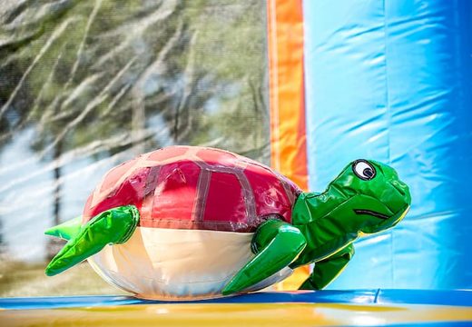 Order a covered multiplay seaworld bouncy castle in a limited height of 2.74 meters and with a slide for both old and young. Buy bouncy castles online at JB Inflatables America 