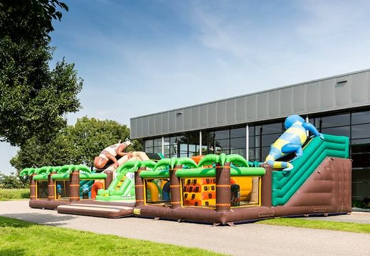 Order a jungle-themed inflatable bouncer with multiple slides and all kinds of fun obstacles with prints for kids. Buy bouncers online at JB Inflatables America