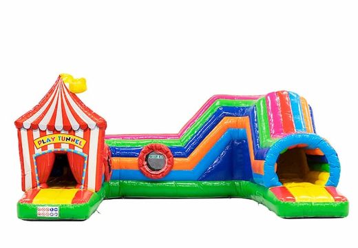 Buy a large circus bounce house with obstacles, a climbing slope and a slide for children. Order bounce houses online at JB Inflatables America 