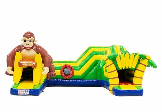 Buy a large gorilla bounce house with obstacles, a climbing slope and a slide for children. Order bounce houses online at JB Inflatables America 
