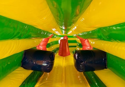 Gorilla-themed inflatable crawl tunnel with obstacles, use a climbing ramp and slide for children. Buy bouncers online at JB Inflatables America 