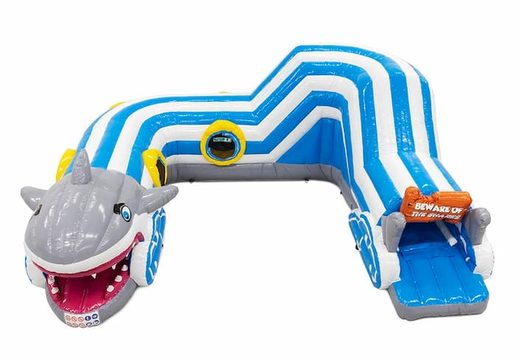 Buy an inflatable shark bounce house with obstacles, a climbing ramp and sliding ramp for children. Order bounce houses online at JB Inflatables America 
