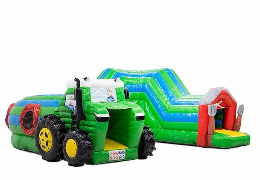 Crawl tunnel tractor bounce house with obstacles, a climbing slope and sliding slope for kids. Buy bounce houses online at JB Inflatables America 