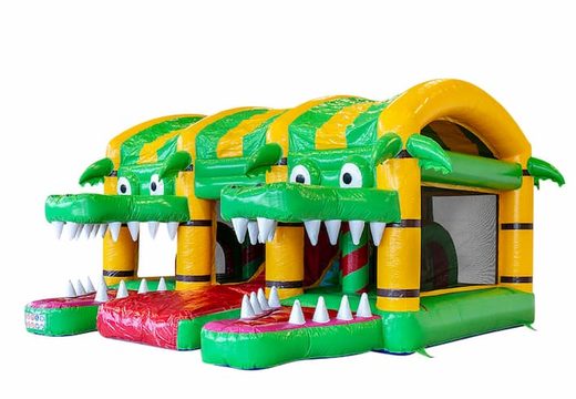 Buy large indoor inflatable xxl bounce house with slide in a crocodile theme for children. Order bounce houses online at JB Inflatables America 