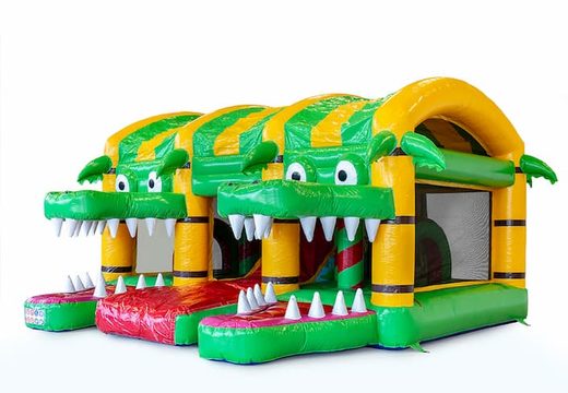 Indoor multiplay crocodile bouncy castle in  unique designs, with a slide and 3D objects for children. Order bouncy castles online at JB Inflatables America 