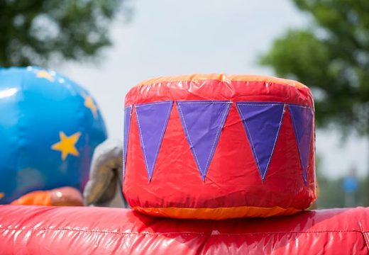 Buy a bouncer in the playzone circus theme with plastic balls and 3D objects for kids. Order bouncers online at JB Inflatables America 
