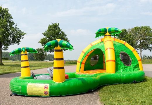 Buy a semi-open playzone jungle bouncy castle with plastic balls and 3D objects for children. Order bouncy castles online at JB Inflatables America 