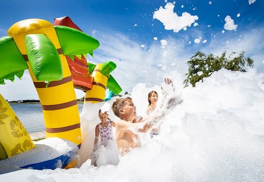 Open Bubble park Hawaii with a foam tap for kids to use. Order inflatable bouncers at JB Inflatables America