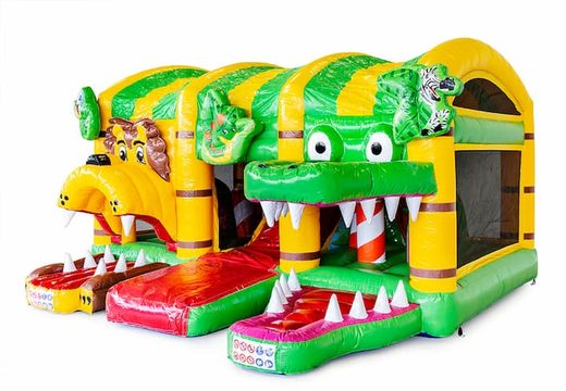 Buy an indoor inflatable bounce house with slide in the jungle world theme for children. Order bounce houses online at JB Inflatables America 