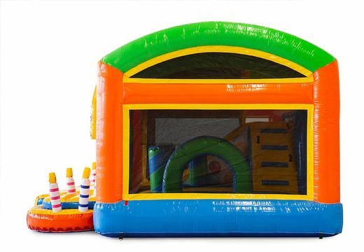 Party themed bounce house with a slide and 3D objects for children. Order bounce houses online at JB Inflatables America 