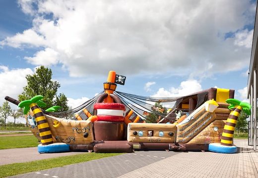 Order Mega Pirates Shooter inflatable bouncer in ship shape with shoot and slide game for kids. Buy inflatable bounce houses online at JB Inflatables America