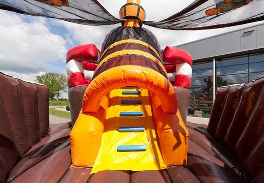 Order Mega Pirate Shooter bounce house in ship shape with shooting game and slide for kids. Buy inflatable bounce houses online at JB Inflatables America