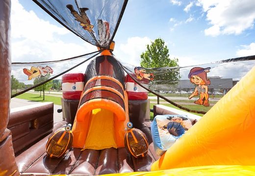 Order Mega Pirate Shooter bouncer in ship shape with shooting game and slide for kids. Buy inflatable bouncers online at JB Inflatables America