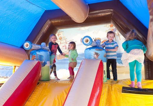 Order shooting combo pirate bounce house covered, with cannon game and slide for kids. Buy inflatable bounce houses online at JB Inflatables America