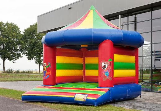 Buy standard carousel bounce houses in circus theme for children. Order bounce houses online at JB Inflatables America
