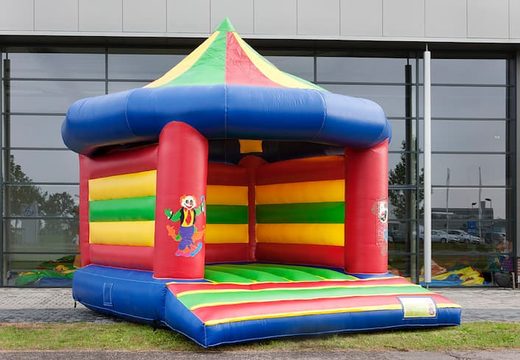 Standard carousel bounce houses for sale in circus theme for children. Buy indoor bounce houses online at JB Inflatables America