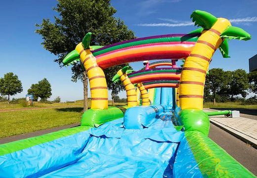 Order Drop & Slide Jungle bounce house with double slide for children. Buy inflatable bounce houses online at JB Inflatables America