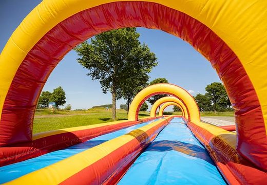 Order a perfect 20m inflatable double tube slide for kids. Buy inflatable belly slides now online at JB Inflatables America