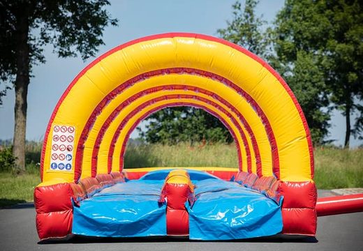 Spectacular inflatable double slide slide 20m long with an extra wide track for children. Buy inflatable belly slides now online at JB Inflatables America