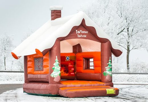 Standard Skihut winterworld bounce house with a 3D chimney on top for children. Buy indoor inflatable bounce houses online at JB Inflatables America