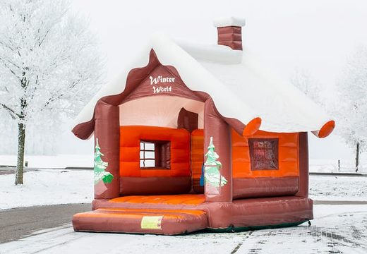 Skihut winterworld bouncer with a 3D chimney at the top for children. Buy bouncers online at JB Inflatables America