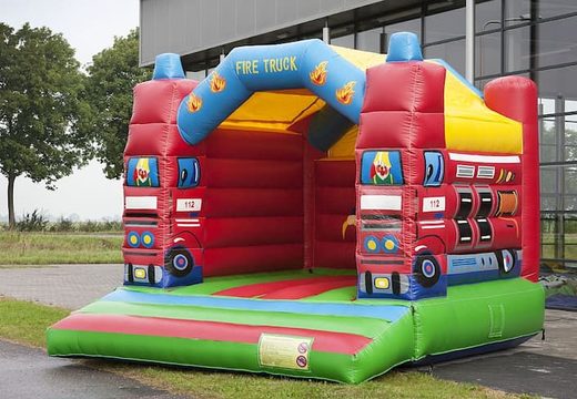 Order a standard fire brigade bounce houses in striking colors for children. Order bounce houses online at JB Inflatables America