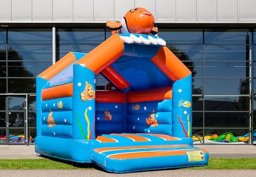 Order standard party bounce houses in striking colors with a large 3D clownfish object on top for children. Bounce houses for sale online at JB Inflatables America