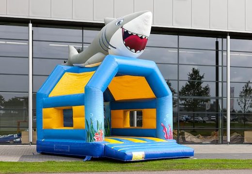 Order unique standard bouncy castles with a 3D object of a shark on the top for children. Buy bouncy castles online at JB Inflatables America
