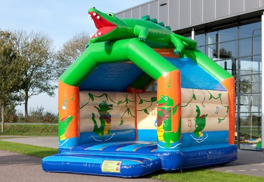 Buy unique standard bounce house with a 3D object of a crocodile on the top for children. Buy bounce house online at JB Inflatables America